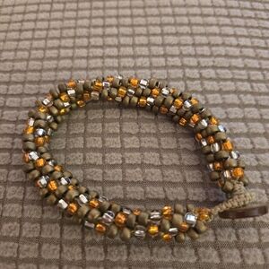 Handcrafted Beaded Bracelet in Gold and Silver